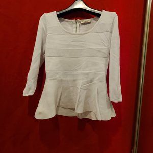 Top with skirt-like bottom